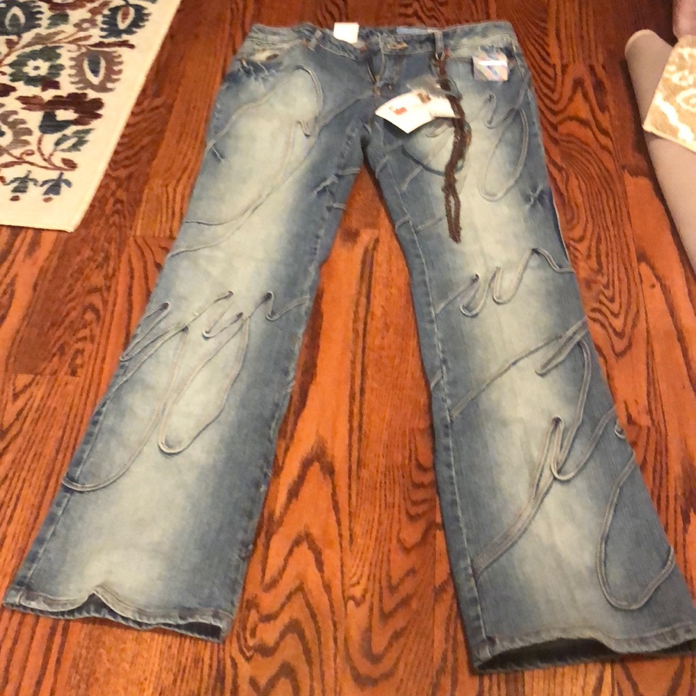 Azzure jeans with chain accent